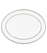 Set the table with poise and purpose. The Library Lane collection features tailored platinum bands on white china that bring black tie elegance to any meal. Oval platter not shown.