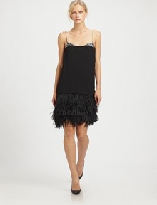 With silk-and-sequin accents on top and layers of lush ostrich feathers on the bottom, an eye-catching silhouette rendered in smooth, chic crepe.Adjustable spaghetti strapsConcealed side zip closureTiered feather hemAbout 16 from natural waistFully linedViscose with silk and ostrich feathersDry cleanImportedModel shown is 5'11 (180cm) wearing US size 4. With silk-and-sequin accents on top and layers of lush ostrich feathers on the bottom, an eye-catching silhouette rendered in smooth, chic crepe.Adjustable spaghetti strapsConcealed side zip closureTiered feather hemAbout 16 from natural waistFully linedViscose with silk and ostrich feathersDry cleanImportedModel shown is 5'11 (180cm) wearing US size 4.