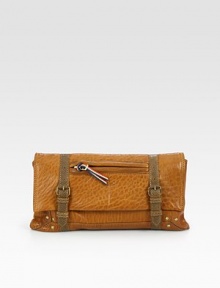 An easy, compact shape constructed with richly-pebbled lambskin leather in warm contrasting tones. Magnetic flap with hidden top zip closureInterior removable mini flashlightCotton lining9¾W X 5½H X 1DImported