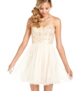 Featuring a shimmery sequin bodice, a fairytale corset-laced back, and a flirty tulle skirt, this strapless dress by Speechless achieves a fresh ready-to-party look!