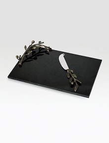 Symbolizing peace and harmony, the olive branch and its shapely leaves gracefully accent a simple slab of rich black granite and form the handle of the matching knife. From the Olive Branch CollectionGranite, oxidized bronze and stainless steel8½W X 12½L; knife 8LHand washImported