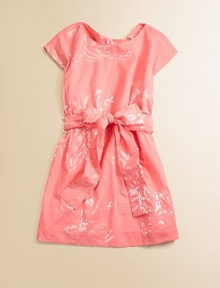 This beautiful, shimmering cotton frock is adorned with outstanding, sequin-covered flowers and has a sash tie for a frock as beautiful as your little girl.ScoopneckShort sleevesPullover style with cross backWaistband with sash tieCottonMachine washImported