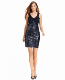 Sequin sensation: A smattering of sparkly sequins at the bust of Calvin Klein's cocktail dress makes it ready for an evening celebration. Sequin sensation: A smattering of sparkly sequins at the bust of Calvin Klein's cocktail dress makes it ready for an evening celebration.