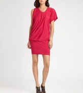 Soft, vibrant jersey, tailored in an asymmetrical silhouette with a flattering side drape.Banded jewel necklineSingle short sleeveFront and back pleatsAsymmetrical side drapeAbout 23 from natural waist68% acetate/27% polyester/5% spandexHand washMade in USA of imported fabricModel shown is 5'10 (177cm) wearing US size Small. 