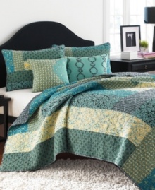 An array of flourishes and florals in a palette of aqua, yellow and brown come together in this Reba quilt from Steve Madden for an artistically ornate appeal. Different patterns are pieced together for an eclectic touch. An array of flourishes and florals in a palette of aqua, yellow and brown come together in this Reba quilt from Steve Madden for an artistically ornate appeal. Different patterns are pieced together for an eclectic touch.