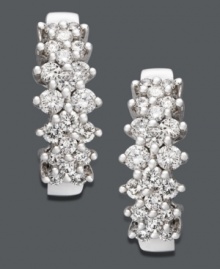 Sparkle to last a lifetime - these glistening hoops add an instant touch of elegance. Crafted in 14k white gold with round-cut diamonds (1 ct. t.w.). Approximate diameter: 3/4 inch.