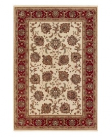 Reminiscent of classic Persian art and culture, this spellbinding rug features a wispy, curvilinear floral pattern in a neutral, burgundy and blue color spectrum. Surrounded by a thin beige border that completes the rug with understated elegance. Easy-care polypropylene ensures durability. Reminiscent of classic Persian art and culture, this spellbinding rug features a wispy, curvilinear floral pattern in a neutral, burgundy and blue color spectrum. Surrounded by a thin beige border that completes the rug with understated elegance. Easy-care polypropylene ensures durability.