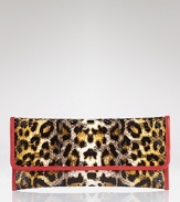 Fete your penchant for prints with this leopard clutch from Carlos Falchi. In snake leather with contrast trims, this bag hints at your inner wild child.