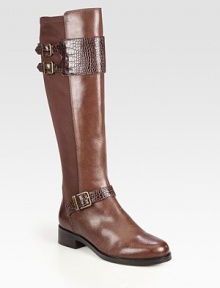 Crocodile-print buckle straps and nylon back paneling update this traditional leather silhouette. Stacked heel, 1¼ (30mm)Shaft, 16Leg circumference, 15Leather and nylon upper with crocodile-print leather strapsPull-on style with adjustable buckle strapsLeather liningRubber solePadded insoleImported