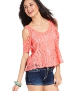 Pretty femme! Shoulder cutouts add trend-right style to this sheer lace top from Fire! Style the piece with denim shorts for a look that marries sweet-wear with street-wear.