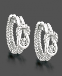 Turn an every day look into utter elegance with Everlon's diamond hoop earrings. Each earring features a round-cut diamond (1/4 ct. t.w.) in a sleek sterling silver setting. Approximate drop: 5/8 inch.