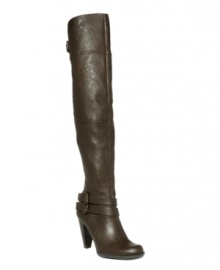 Mixed message: Leather combines with suede in GUESS' stylish Sawyer over-the-knee boots. In black leather with non-adjustable buckle detailing, a stacked heel and zipper enclosure. Mixed message: Leather combines with suede in GUESS' stylish Sawyer over-the-knee boots. In black leather with non-adjustable buckle detailing, a stacked heel and zipper enclosure.
