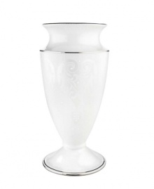 A beautiful porcelain vase with a light detailed design and platinum trim, perfect for all your floral arrangements and striking enough to stand regally all on its own. Qualifies for Rebate A beautiful porcelain vase with a light detailed design and platinum trim, perfect for all your floral arrangements and striking enough to stand regally all on its own. Qualifies for Rebate