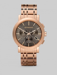 A standard-bearer of gentlemanly style, designed with a taupe dial and three-eye chronograph functionality on a check-inspired link bracelet. Round bezel Quartz movement Three-eye chronograph functionality Water resistant to 5 ATM Date function at 4 o'clock Second hand Stainless steel case: 40mm (1.57) Link bracelet: 20mm (0.79) Deployment clasp Made in Switzerland 