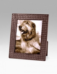 Hand-woven Intrecciato nappa leather gives a favorite photo the presence it deserves. Accommodates a 8 X 10 photograph Overall, 12½ X 10½ Made in Italy Hand-woven Intrecciato nappa leather gives a favorite photo the presence it deserves. Accommodates a 8 X 10 photograph Overall, 12½ X 10½ Made in Italy