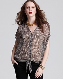 This sheer, printed Joie blouse updates your new-season wardrobe with modern elegance, rendered in luxe silk and tying at the hem for a relaxed look with LBPs and skinny jeans.