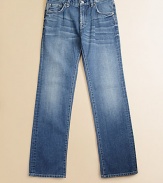 Featuring a subtly faded, medium wash, these cotton jeans will be one of his favorite styles, guaranteed.Button closureZip flyFront whiskeringFive-pocket styleBelt loopsMetal rivet details Slightly distressed pocketsCottonMachine washImported