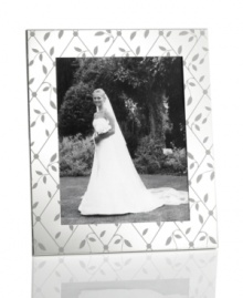 Detailed with diamond latticework, the silver-plated Petal Trellis picture frame lends everlasting romance to modern homes and special moments. A gift any couple will cherish. From Martha Stewart Collection. Detailed with diamond latticework, the silver-plated Petal Trellis picture frame lends everlasting romance to modern homes and special moments. A gift any couple will cherish. From Martha Stewart Collection.