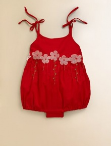 Pretty little flowers add a splash of fun to this adorable bodysuit in a sweet bubble silhouette.ScoopneckSpaghetti straps with shoulder tiesFront buttonsPleated waist with flower appliquéBottom snaps for easy on and offCottonMachine wash coldImported Please note: Number of snaps/buttons may vary depending on size ordered. Pretty little flowers add a splash of fun to this adorable bodysuit in a sweet bubble silhouette.ScoopneckSpaghetti straps with shoulder tiesFront buttonsPleated waist with flower appliquéBottom snaps for easy on and offCottonMachine wash coldImported Please note: Number of snaps/buttons may vary depending on size ordered.