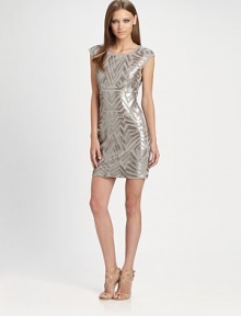 A shining example of great style and modern design, this sequin design has a slim, stretch fit.Cap sleeveSequin front and backSide zipperAbout 20 from natural waist65% rayon/30% nylon/5% spandexDry cleanImportedModel shown is 5'9½ (176cm) wearing US size Small. 