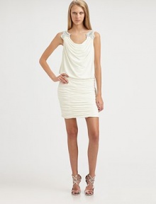 Glamorous embellished straps and a prettily draped bodice define this evening-perfect style.ScoopneckEmbellished shoulder strapsCowl draped bodiceRuched skirtConcealed side zipFully linedAbout 20 from natural waist95% polyester/5% spandexDry cleanImportedModel shown is 5'9 (175cm) wearing US size 4. 