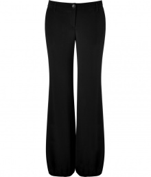 These classic wide leg pants feature an elasticized cuff for a cool, cutting-edge flowing silhouette -Zip with button closure, belt loops, relaxed silhouette, elasticized cuffs - Style with a fitted blouse, a bold shoulder blazer, and platform pumps These classic wide leg pants feature an elasticized cuff for a cool, cutting-edge flowing silhouette -Zip with button closure, belt loops, relaxed silhouette, elasticized cuffs - Style with a fitted blouse, a bold shoulder blazer, and platform pumps