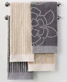 A breath of fresh air. Martha Stewart Collection revives your bathroom in carefree style with this Calendula hand towel, featuring either a stripe or floral pattern in two neutral hues. A breath of fresh air. Martha Stewart Collection revives your bathroom in carefree style with this Calendula hand towel, featuring either a stripe or floral pattern in two neutral hues.