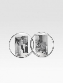 This gorgeous double frame uses the classic symbolism of joined circles, and makes the perfect wedding or anniversary gift.Metal & glassHolds two 5 x 7 photosImported This gorgeous double frame uses the classic symbolism of joined circles, and makes the perfect wedding or anniversary gift.Metal & glassHolds two 5 x 7 photosImported