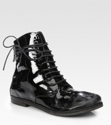 Extra long wrap-around laces add urban-cool style to this easy patent leather silhouette. Stacked heel, ¾ (20mm)Patent leather upperBack zipLeather lining and solePadded insoleMade in ItalyOUR FIT MODEL RECOMMENDS ordering one half size up as this style runs small. 