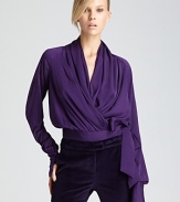 Rachel Zoe's scarf top in swathes of silk makes for luxe dressing. A feminine bow finishes the look.