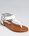 Chic and sweet, Steve Madden's Jsrenite sandals complete her look with an elegant charm.
