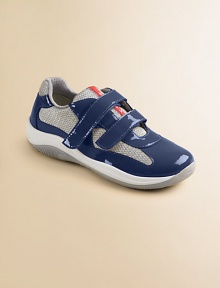 Sneaker with double grip-tape closure in patent leather with grey mesh. Rubber sole Imported
