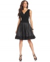 A hemline full of feathery fringe makes this petite SL Fashions party dress extra fun.