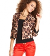 Polished with attitude. XOXO's three-quarter sleeve animal-print blazer spices up your day-to-night look with bold, sophisticated style.