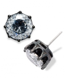 Glitz and glamour can be yours with this pair of oversized stud earrings from Juicy Couture. Cast in a round silver tone brass, a sparkling cubic zirconia (8 ct. t.w.) lights up the night. Approximate diameter: 3/8 inch. Glitz and glamour can be yours with this pair of oversized stud earrings from Juicy Couture. Cast in a round silver tone brass, a sparkling cubic zirconia (8 ct. t.w.) lights up the night. Approximate diameter: 3/8 inch.