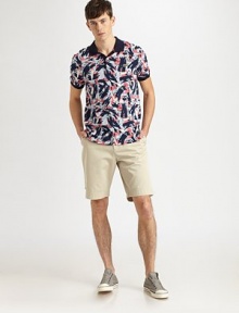 Incredibly vibrant print pattern highlights this classic cotton silhouette.Two-button placketCottonMachine washImported