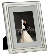 Always look elegant within the Chime picture frame from Vera Wang. Luxe silver plate with clean lines and beveled edges makes a lasting impression all its own. Interior rim features classic ribbed detail.