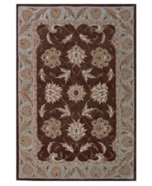 Classic sophistication takes root as flowering vines and elegant palmettes add a touch of tradition to your space. Hand tufted in densely woven polyester and acrylic, this plush area rug from Dalyn will maintain its subtle coloration and rich texture for years to come. Classic sophistication takes root as flowering vines and elegant palmettes add a touch of tradition to your space. Hand tufted in densely woven polyester and acrylic, this plush area rug from Dalyn will maintain its subtle coloration and rich texture for years to come.
