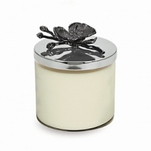 Michael Aram Signature Home Scents are weightless, subtle and universal yet exuberant and complex. These fragrances take their inspiration from the same organic motifs that made the artist famous. The Black Orchid Candle was inspired by the rich ambiance of evening and haute couture…gothic and feline…velvety, sensual and intoxicating. The essential elements in the base notes are deep cedar and sandalwood accented with warm musk. The intense middle essence is built on florals and tropical fruits while the top notes are made lithe with sheer citrus Michael Aram Signature Home Scents are weightless, subtle and universal yet exuberant and complex. These fragrances take their inspiration from the same organic motifs that made the artist famous. The Black Orchid Candle was inspired by the rich ambiance of evening and haute couture…gothic and feline…velvety, sensual and intoxicating. The essential elements in the base notes are deep cedar and sandalwood accented with warm musk. The intense middle essence is built on florals and tropical fruits while the top notes are made lithe with sheer citrus