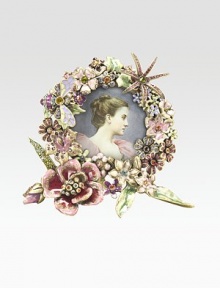 Carefully placed Swarovski crystals lend an opulent, heirloom-quality floral touch to this charming little frame that's handcrafted in brass ox-plated pewter. From the Mille Fiore Collection 5% of the retail price will be donated to the Breast Cancer Research Foundation Accommodates a 2 photograph Overall: 4W X 3¾H Handmade in USA 