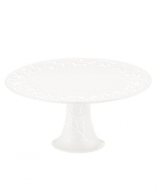 An elegant white-on-white pattern, embossed vine motif and interior glaze adorn this medium cake stand from Lenox dinnerware. The dishes from the Opal Innocence Carved collection get the dessert table set for refined dining every day. Qualifies for Rebate