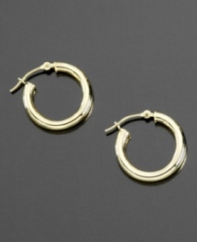 Give your everyday look that extra-special touch with these pretty and versatile 14k gold hoop earrings. Approximate diameter: 1/5 inch. Give your everyday look that extra-special touch with these pretty and versatile 14k gold hoop earrings. Approximate diameter: 1/5 inch.