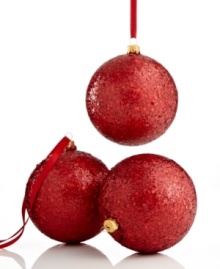 Prepare to be dazzled. Glittery red ball ornaments crafted of shatterproof glass guarantee a tree that's always merry and bright. From Kurt Adler. Prepare to be dazzled. Glittery red ball ornaments crafted of shatterproof glass guarantee a tree that's always merry and bright. From Kurt Adler.