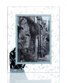Etched with delicate latticework, the Petal Trellis picture frame lends everlasting romance to modern homes. A gift any couple will cherish in luminous glass from Martha Stewart Collection. Etched with delicate latticework, the Petal Trellis picture frame lends everlasting romance to modern homes. A gift any couple will cherish in luminous glass from Martha Stewart Collection.