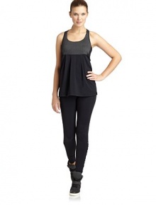 THE LOOKScoopneckSleevelessBuilt-in self braEmpire waist with pleated detailsA-line silhouetteMultiple back straps with cutoutsTHE FITAbout 23 from shoulder to hemTHE MATERIALNylon/spandexCARE & ORIGINMachine washImportedModel shown is 5'9 (175cm) wearing US size Small. 