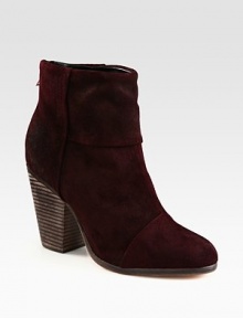 Go-to staple of buttery suede with an uplifting stacked heel. Stacked heel, 3½ (90mm)Suede upperBack zipLeather lining and solePadded insoleImported