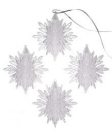 Shimmer and shine. Add a look of winter wonderment to your tree with this set of four snowflake ornaments embellished with silver sparkles for a luminous quality. Shimmer and shine. Add a look of winter wonderment to your tree with this set of four snowflake ornaments embellished with silver sparkles for a luminous quality.