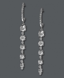 Stun them all with sparkle. EFFY Collection's glamorous five-stone drop earrings feature large and small round-cut diamonds (1 ct. t.w.) in 14k white gold. Approximate drop: 1-5/8 inches. Stun them all with sparkle. EFFY Collection's glamorous five-stone drop earrings feature large and small round-cut diamonds (1 ct. t.w.) in 14k white gold. Approximate drop: 1-5/8 inches.