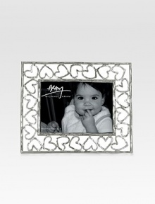 Finding inspiration from the imagery that floats around classic storytelling, this charming frame is crafted from hand-forged, nickel-plated metal by one of America's premier metalwork artists. From the Heart CollectionOverall, 7¼ X 9¼Accommodates a 4 X 6 photographArrives in a gift box for giving or storingImported Finding inspiration from the imagery that floats around classic storytelling, this charming frame is crafted from hand-forged, nickel-plated metal by one of America's premier metalwork artists. From the Heart CollectionOverall, 7¼ X 9¼Accommodates a 4 X 6 photographArrives in a gift box for giving or storingImported