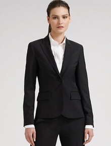 Gently fitted stretch wool in a one-button style with notched lapels. Buttoned cuffs One chest and two side pockets Slightly tapered waist Back vent About 24 from shoulder to hem Fully lined Wool/Lycra Dry clean Imported